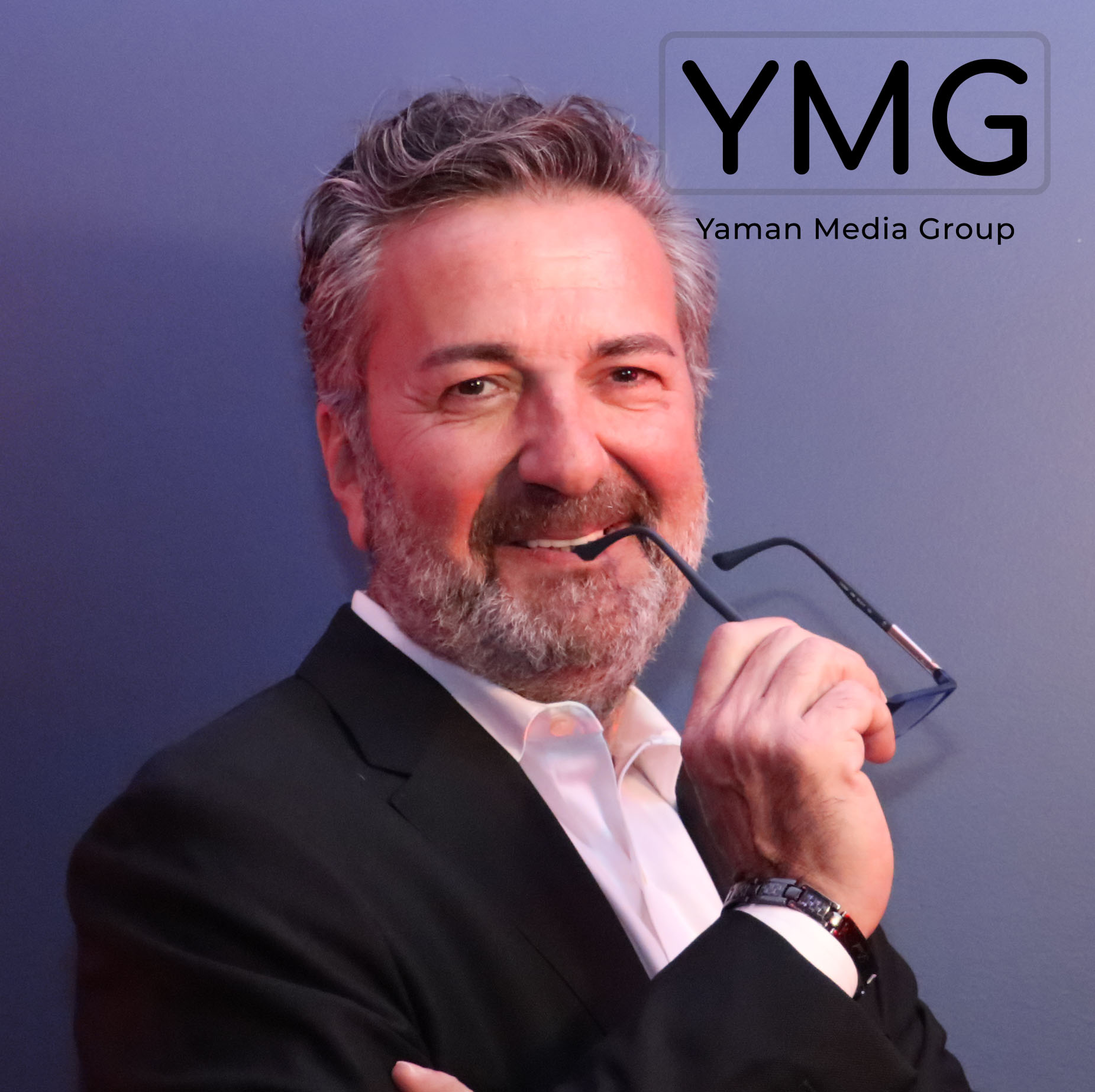 Yaman Coskun headshot with the Yaman Media Group logo